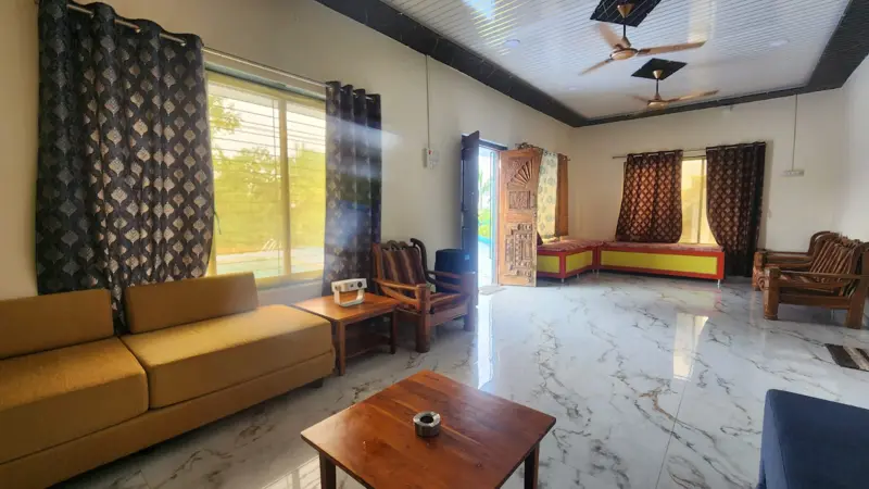 The Grand Hall with sofas, seating and marble floor